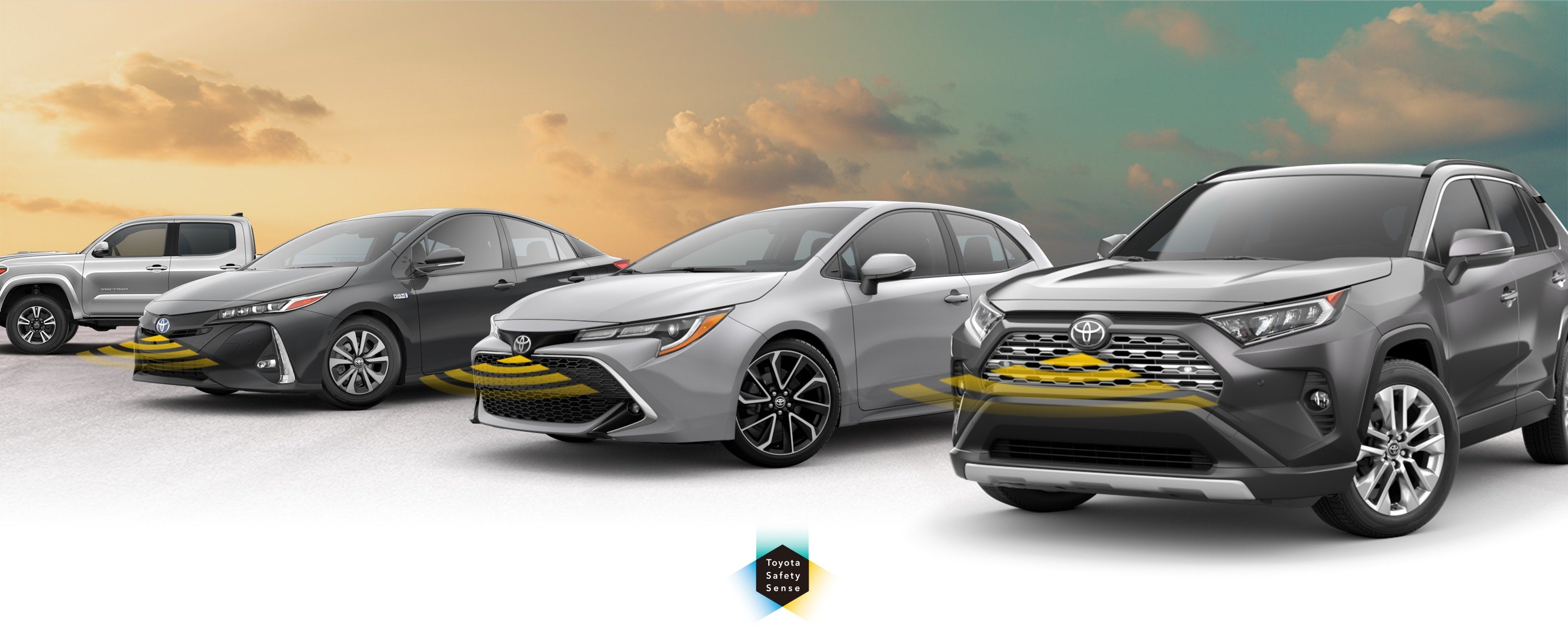 Toyota Safety Sense: Designed for Safety. Options shown on Toyota models including RAV4, Tacoma, and Camry, available now at Toyota of Lake City in Seattle WA.